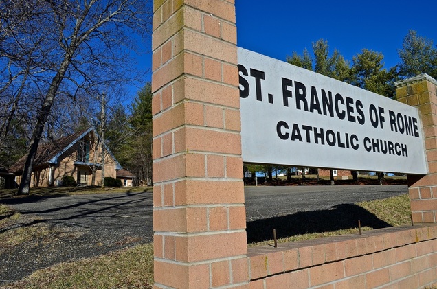 St. Frances of Rome sign and church from outside